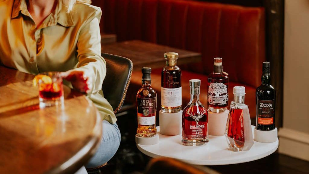 Demeter Collection Group on Side Table with Female Model